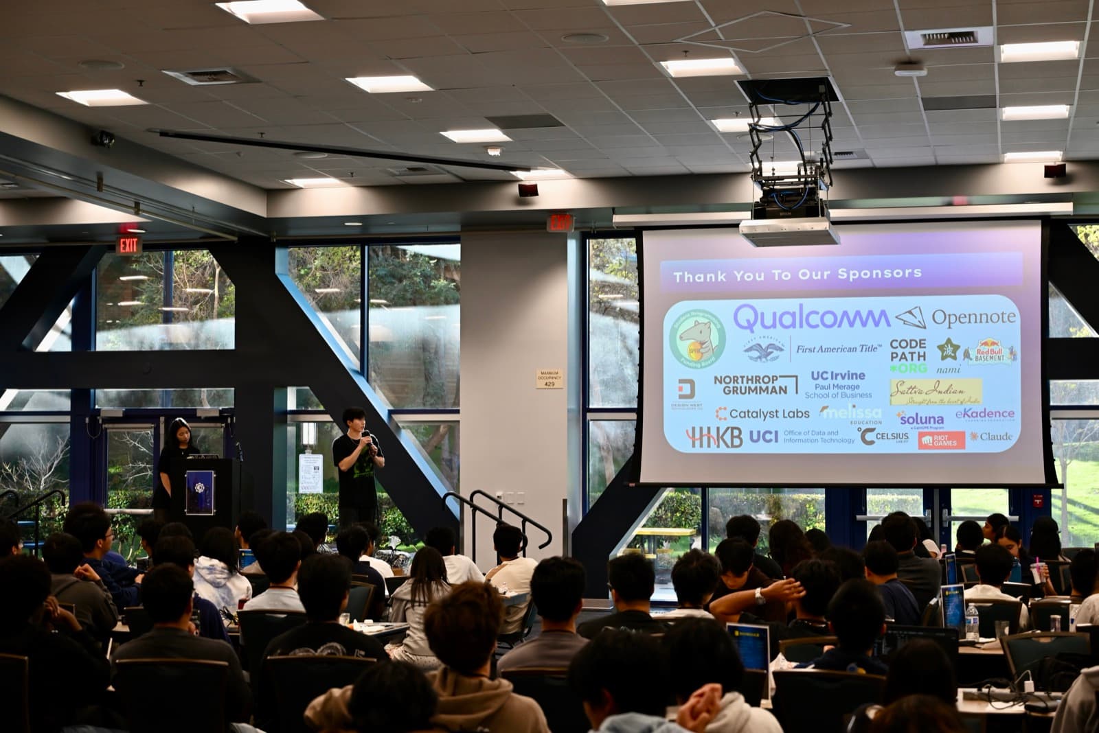 Emceeing IrvineHacks in front of the sponsor slide